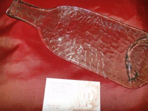 Clear textured slumped bottle