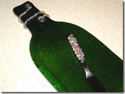 Slumped textured wine bottle with glass beaded knife